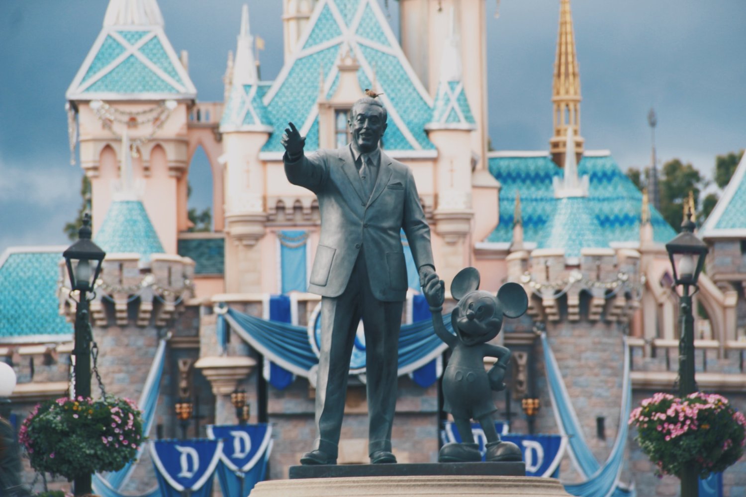 Walt Disney Mickey Mouse in front of castle